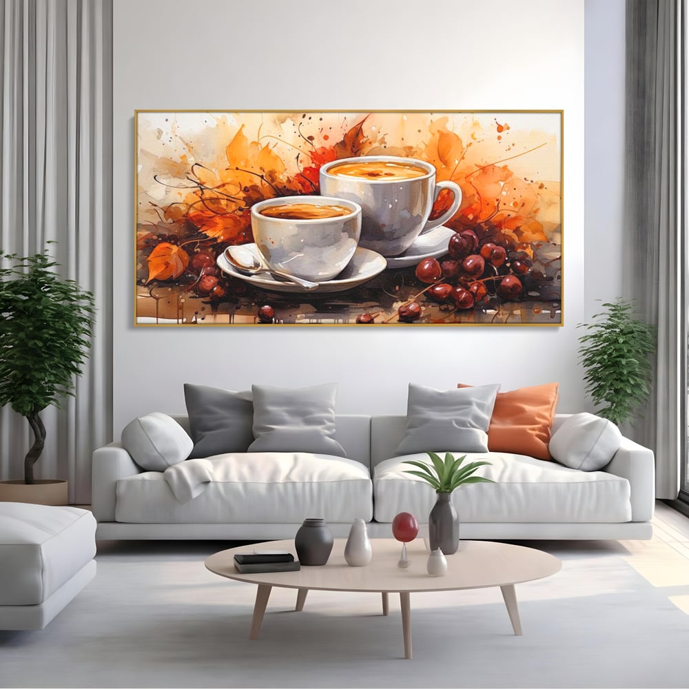 Tablou canvas cu pictura cu doua cesti de cafea si frunze de toamna, in rama de aluminiu auriu, pe perete intr-un living